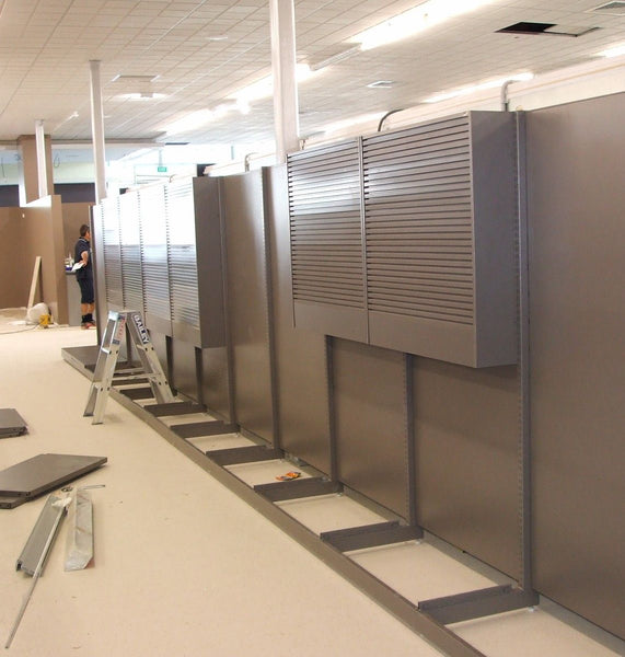 brown 25mm pitch aluminium slatwall panels are on display in commercial outfit