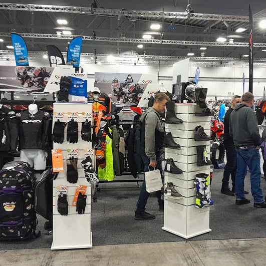 2 x Plankwall box tower display stands in white slatwall TOWX164ECONat a motorcycle trade show displaying shoes and gloves