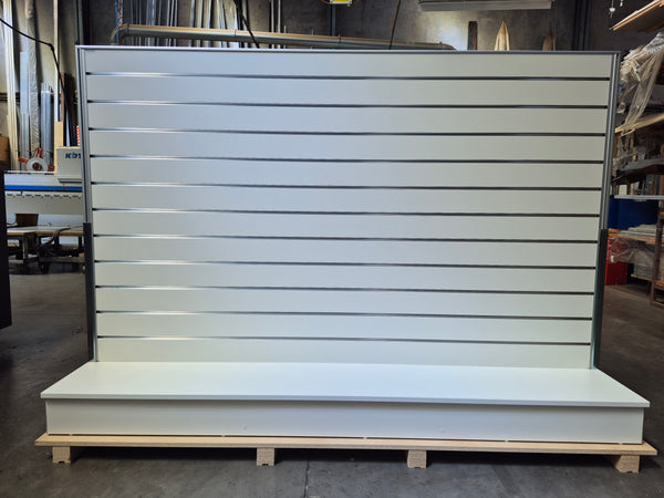 Plankwall free standing display wall panel - bespoke double width in white shown in a factory setting