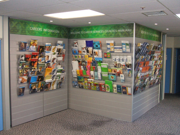 Calext modular brochure display system wall-mounted on Plankwall panels with various brochures and with a sign 'Careers Information' in the Counties-Manukau Career Services office