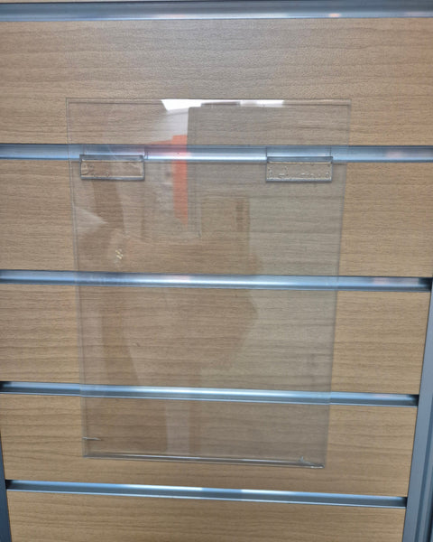 Clear acrylic sign and brochure holder secured with PC2 slatwall clips mounted on a slatwall panel 