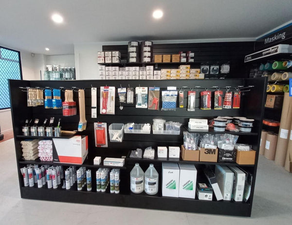 retail slatwall gondola slatwall shelving unit with various products 