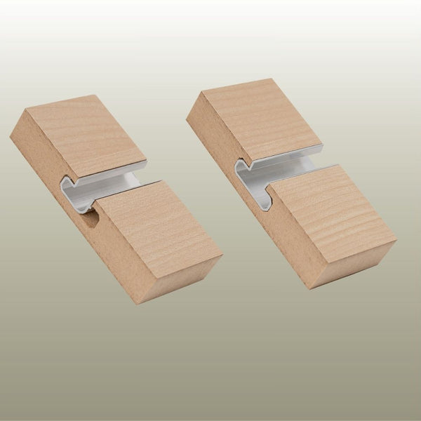 close ups of Stickman slimline Aluminium slatwall inserts: INSALI: J shaped slatwall insert and INTALI: T shaped slatwall insert on a gold background 