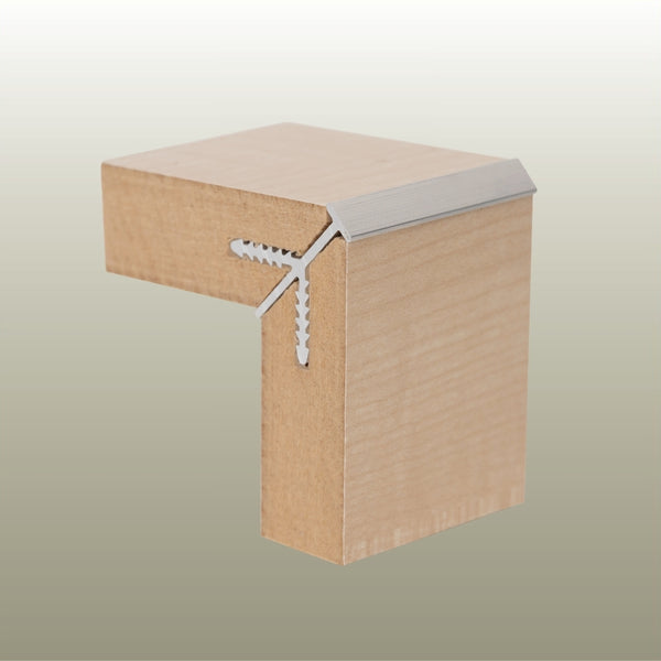 product shot of a Stickman low profile corner join for MDF panels on a gold background