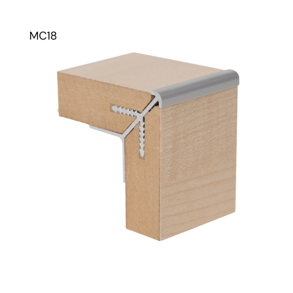 close up of a Stickman sample of a MC18 round head aluminium corner profile joining two light wood MDF panels on a white background labelled MC18