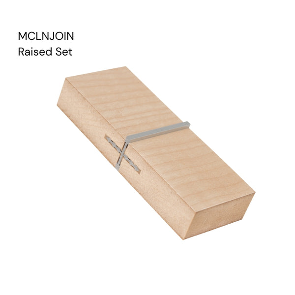 Hero shot of a MCLNJOIN Linear Butt Join aluminium joinery profile with raised set labelled in MDF on a  white background
