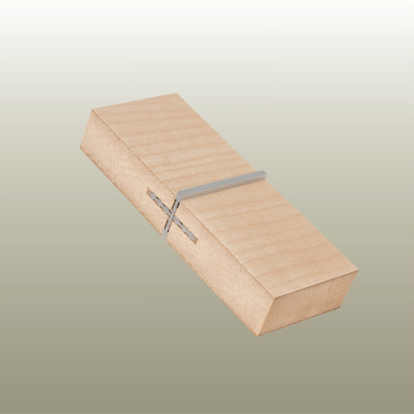 Hero shot of a MCLNJOIN Linear Butt Join aluminium joinery profile with raised set in MDF on a gold background