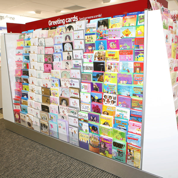 Photo of Calext adjustable print display system used to display greeting cards in a store