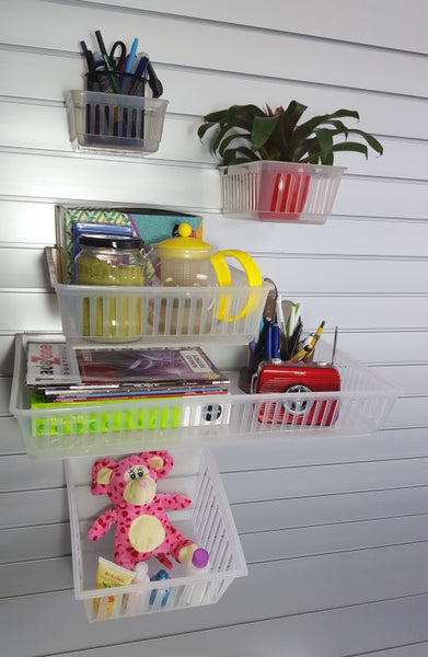 photo of a collection of Plankwall slatwall cratebox display containers on a retail wall with products 