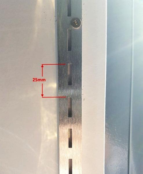 shown here is the measurement for slotted wall channel in aluminium mill finish that supports metal shelving for retail displays