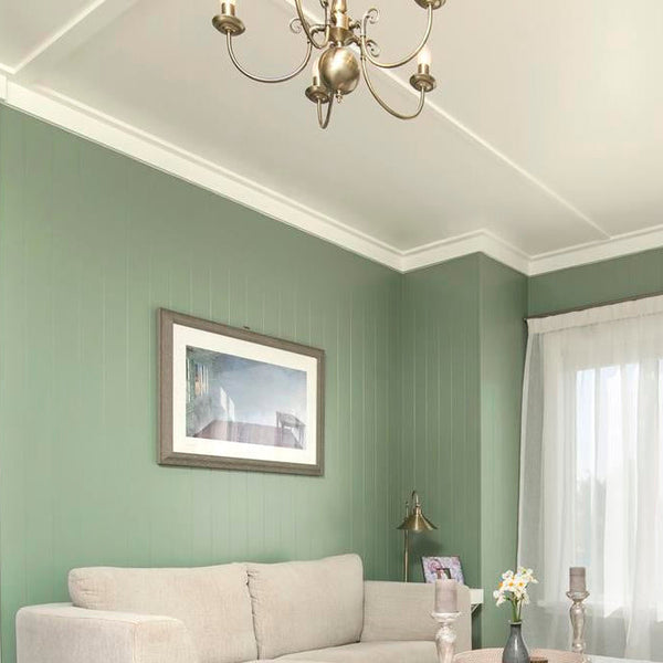 Plankwall 150mm V Groove MDF painted mint green in sitting room