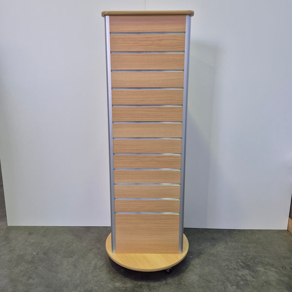 Plankwall 3-sided rotating floor display stand in Tawa front view