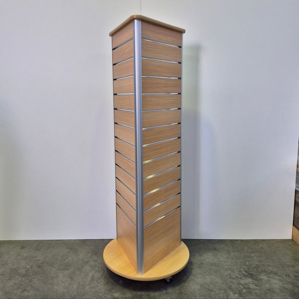 Plankwall 3-sided rotating floor display stand in tawa side view