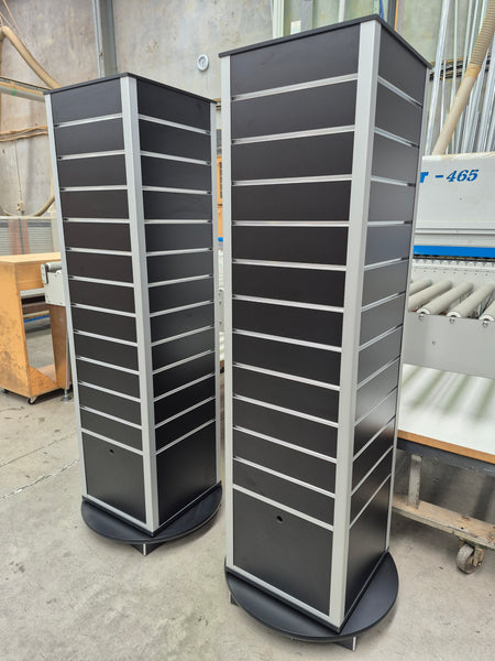Plankwall Black Display Tower Units x2 in a factory setting made with RA18 aluminium corner profiles