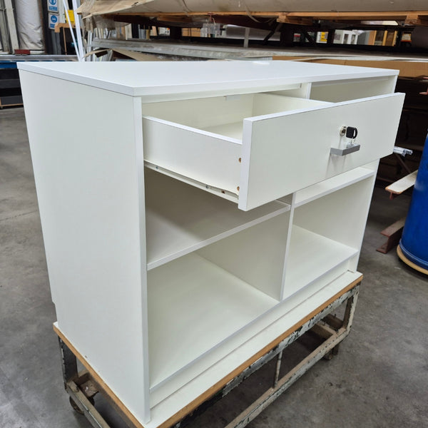 Plankwall cashier desk retail counter in white, lockable drawer opened and shelves. back view  - cut out
