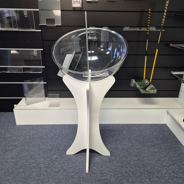 Plankwall clear Acrylic Fishbowl display stand with white legs shown without stock in showroom on black plankwall background