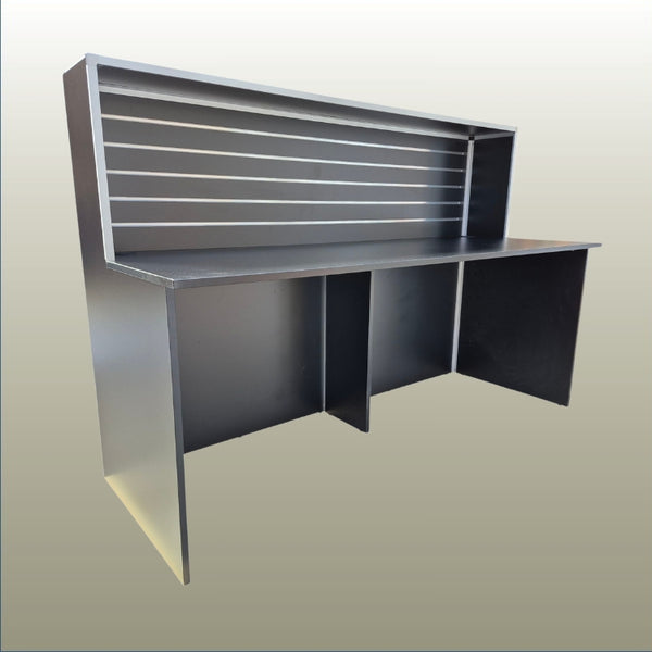 Plankwall Black reception desk retail counter on a gold background