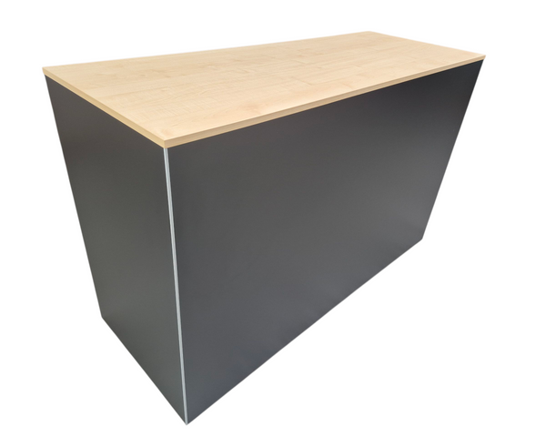 Plankwall retail counter in black with a maple wood finish top on a white background
