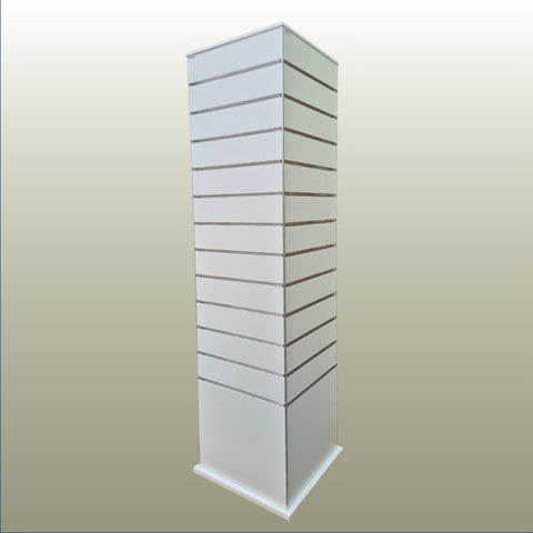 A white slatwall display tower with multiple horizontal rectangular slots, shown at a three-quarter angle against a neutral gradient background.