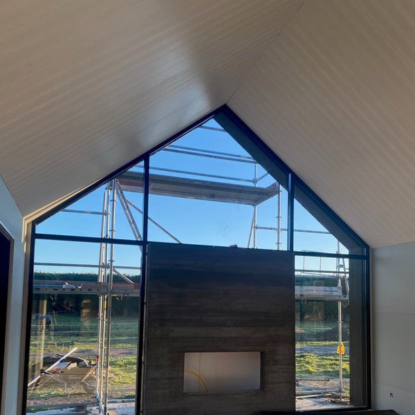 Plankwall V Groove 150mm vaulted ceiling in partially finished house 