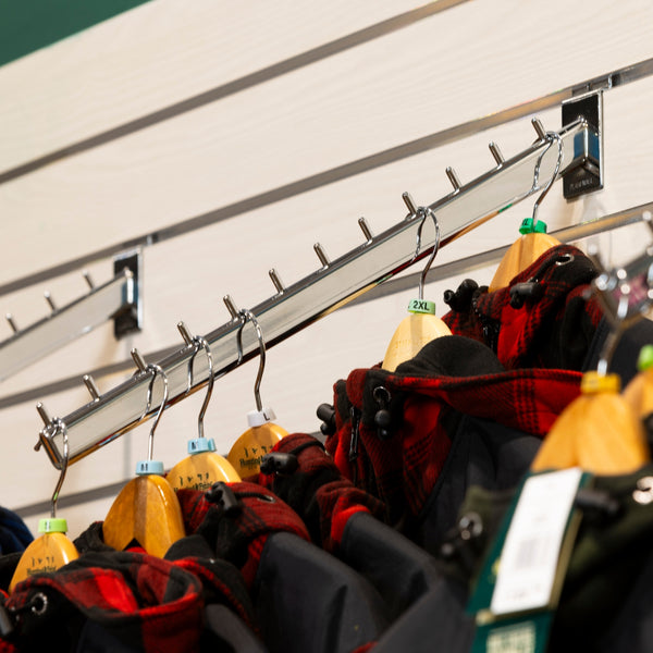Close up of a Plankwall Retail Garment  Display Waterfall Bracket - 12 prongs for with Jackets