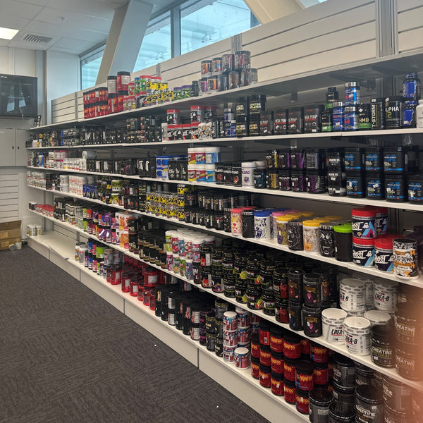 Plankwall Free Standing white slatwall free standing display walls with shelving. Code FS2212PW using G18PB. With plinth.