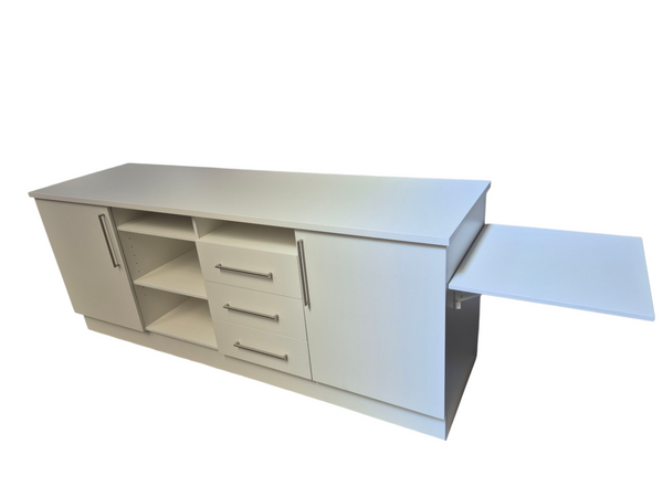 Plankwall retail counter in white with drawers and cupboards and a hinged shelf on a white background