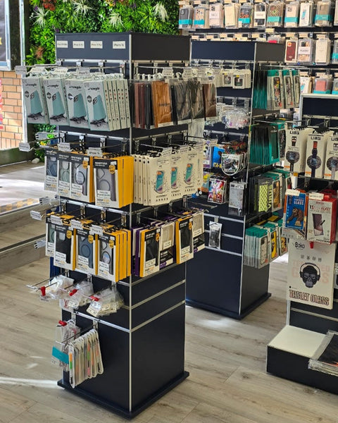 2 x Plankwall slimline box tower display stands in black slatwall TOWX164ECON in a retail store displaying phone accessories
