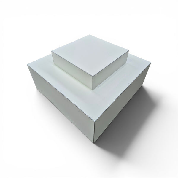 Plankwall two tier retail display plinth in white shown on a white background