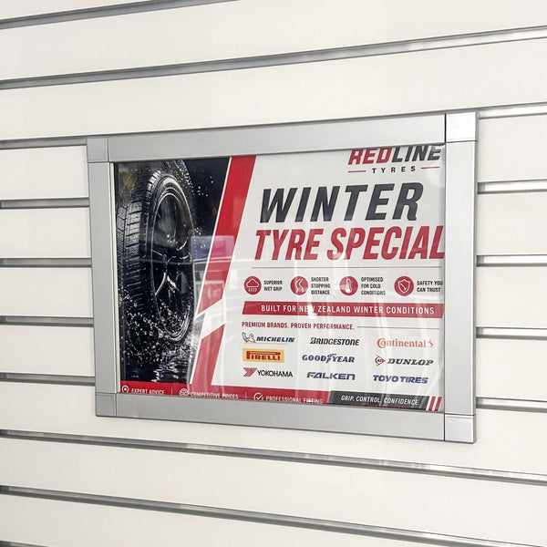 shown here a horizontal retail tyre ad in postaframe size a3