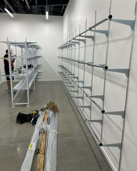 Heavy-duty Wideline slotted bracket installed in mild steel slotted wall channel  for retail set-up