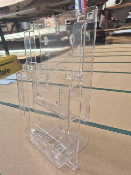 Stacked tiered clear acrylic showing multi-brochure holders desk mounted display setup