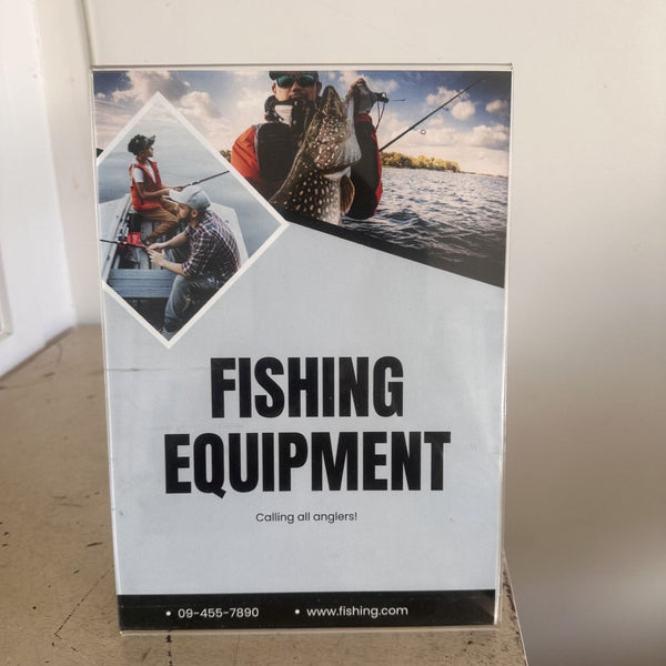 Fishing equipment advertisement with images of people fishing and text on a white background in angled sign holder