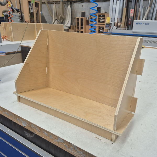 custom wooden display shelf in a workshop setting
