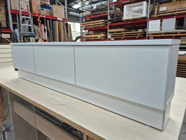 Custom low drawer cabinet unit in a factory setting