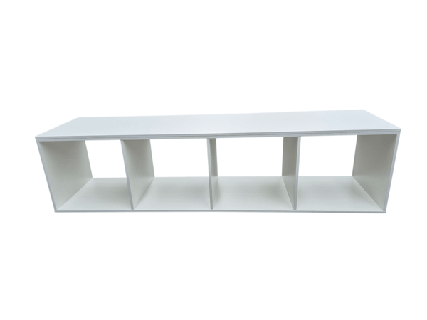 White rectangular shelving unit with four open cubby hole compartments on a white background