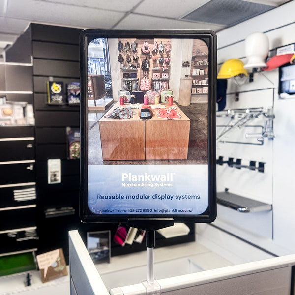 Advertisement for Aotea magazine in a modern office setting