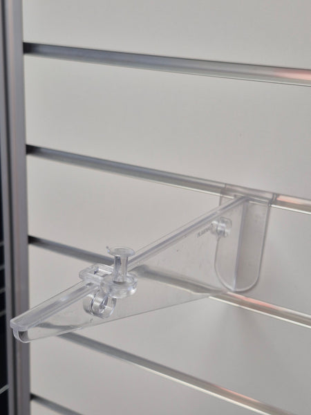 photo of clear locking pad for the polycarbornate shelf bracket