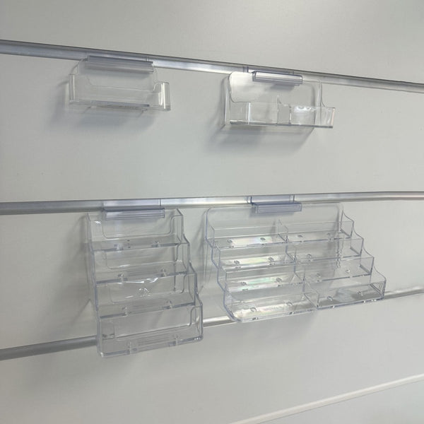 clear acrylic business card holder with supergrip clip wall mounted on slatwall panel system 