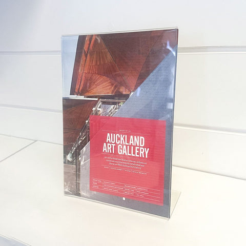 Sloping angled clear acrylic sign holder display article 