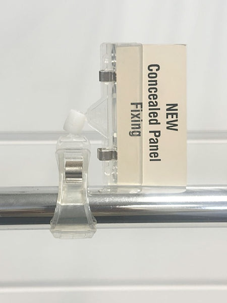 Plankwall card clip with rotating head attached to a garment rail for retail price signage.