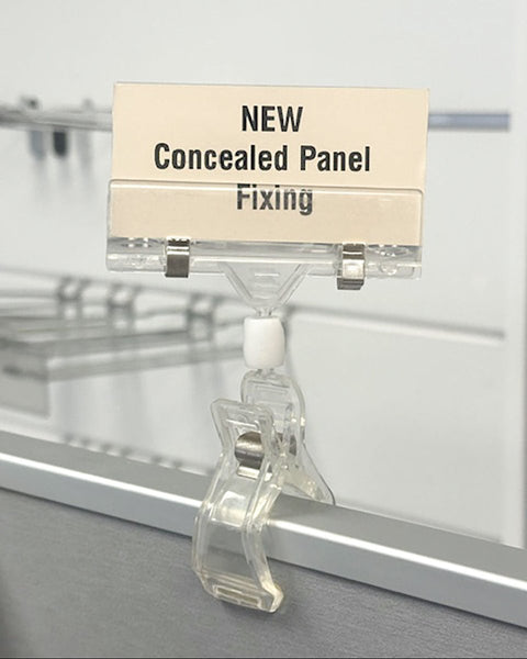 Plankwall card clip with rotating head attached to a gondola display panel shown 