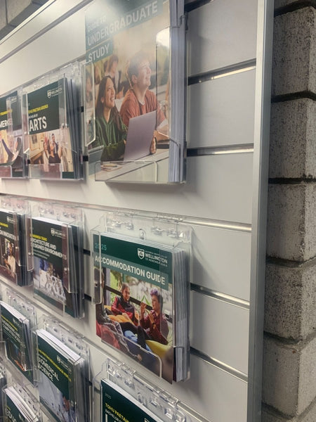 Plankwall clear acrylic brochure holders on retail wall