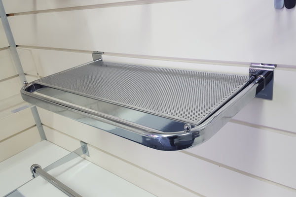 Detail view of Plankwall garment rail mesh shelf showing airflow and folded item support