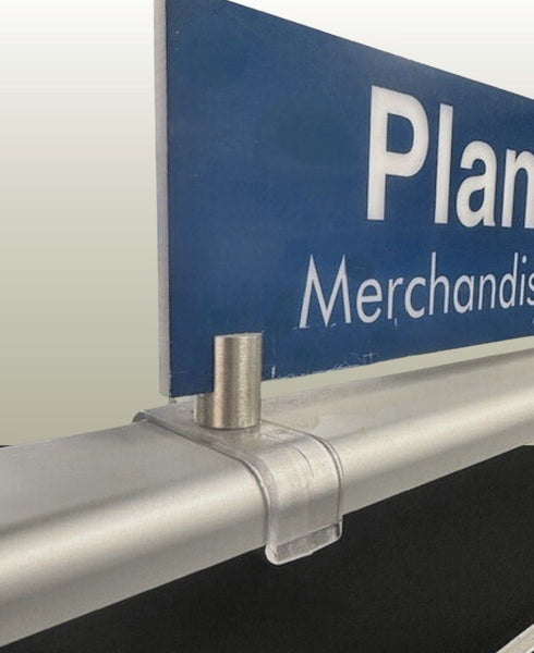 Close-up of Plankwall End Panel Sign Holder in satin chrome finish, screw-fixed to a gondola end panel for holding 8 mm retail signage cleanly and securely.