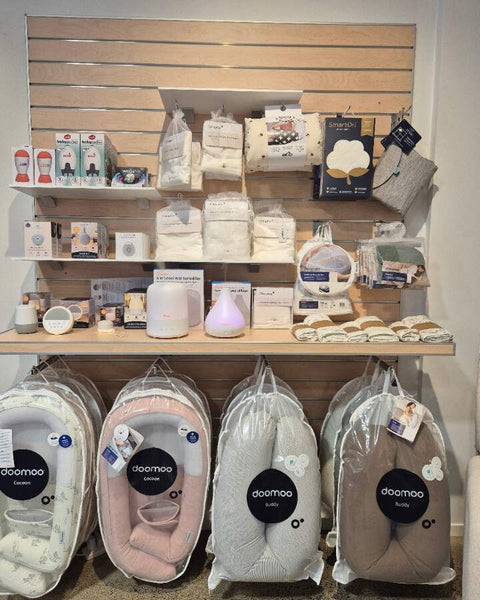 Plankwall slatwall display system installed at Dimples Baby shop, showcasing organised retail shelving and baby product displays