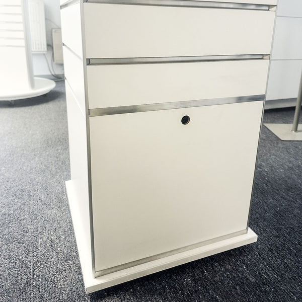 Slimline rotating box tower display stand with built in hidden storage at the bottom detail