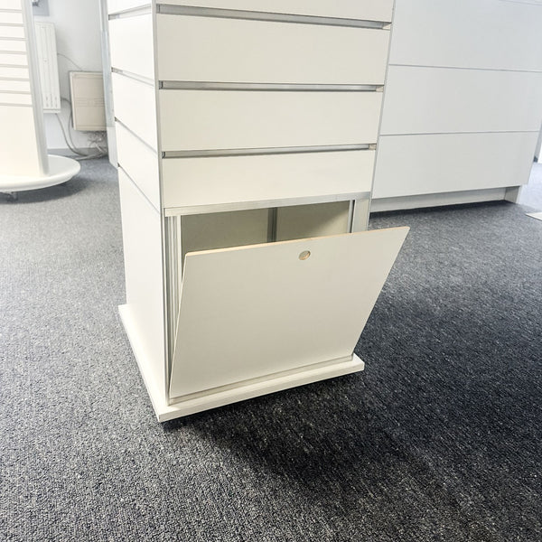 Slimline rotating box tower display stand with built in hidden storage at the bottom