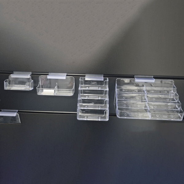 Clear acrylic business card holder supported by slatwall supergrip clip 