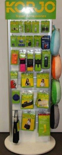 airport essentials on plankwall's two sided display stand tower